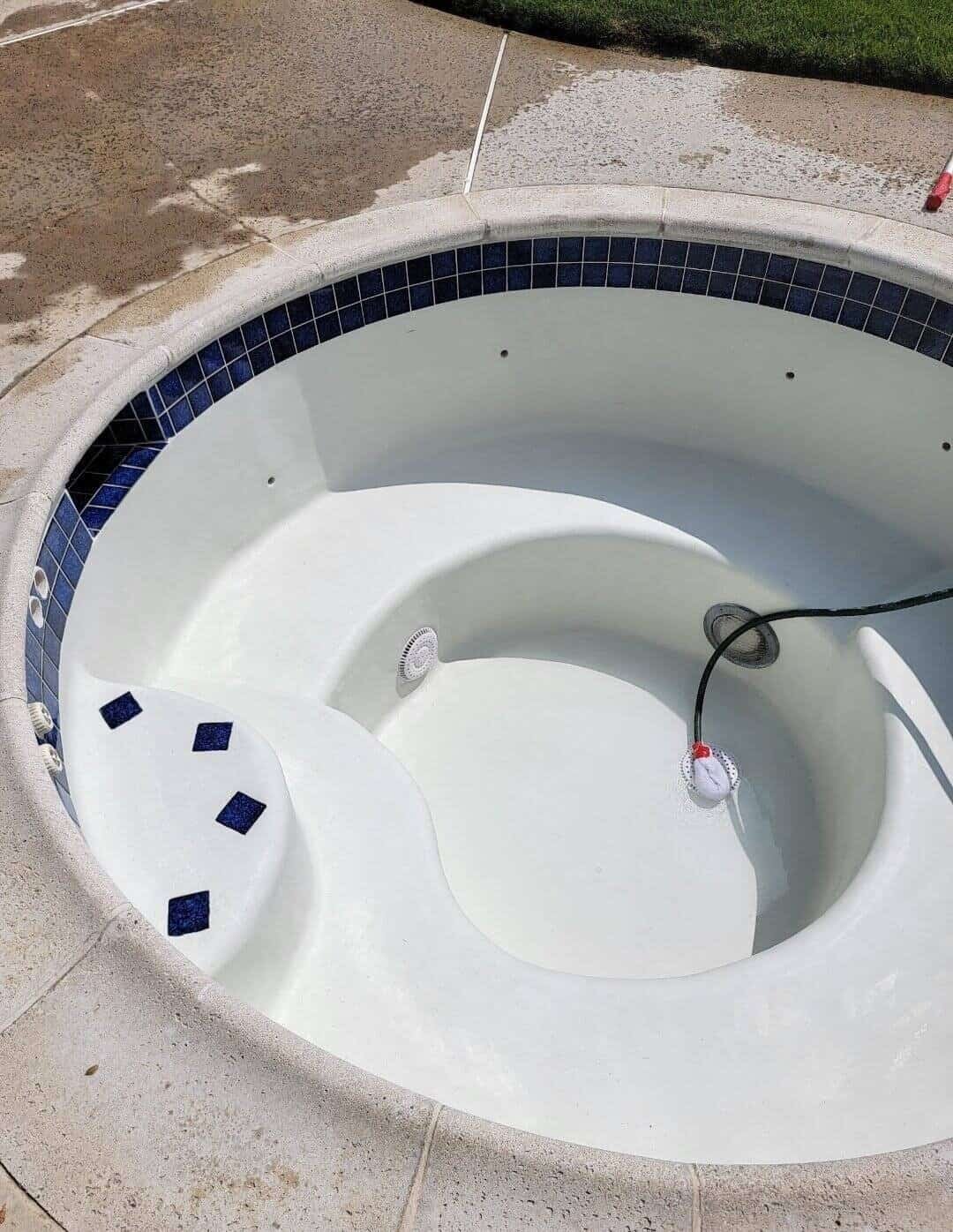 Resurfaced pool floor and interior finished by CA's Finest & Quality Pool Plastering in Southern California